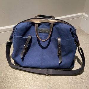 Lowell canvas side bag with leather straps made in Canada.